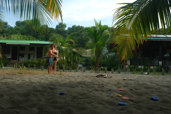 Ben and Alena playing a beach game outside Casa Morrillo