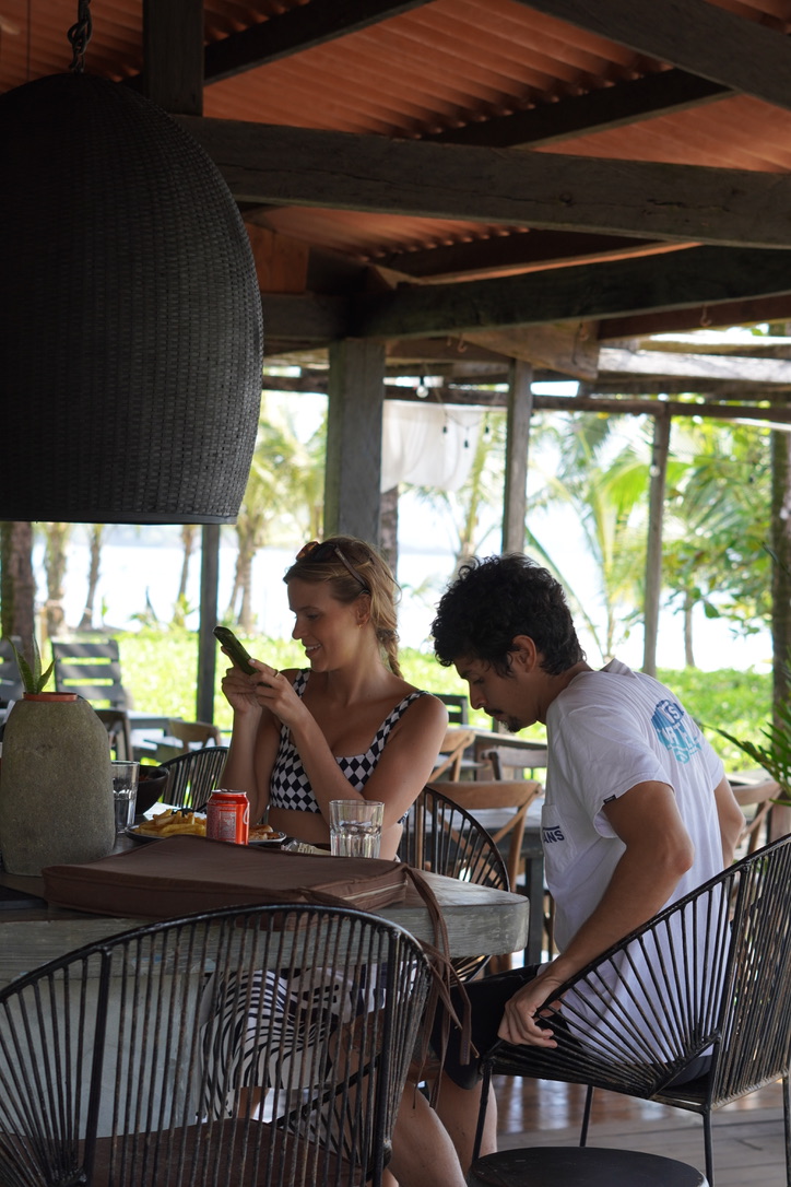 Guests sharing lunch in the open-air restaurant at Casa Morrillo